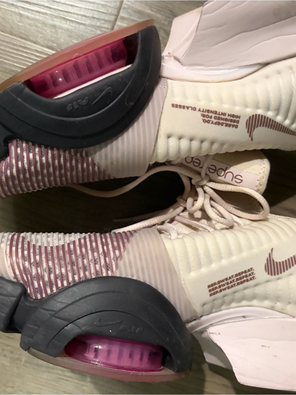 Nike Women’s Sneakers in Light Pink and Burgundy Accents